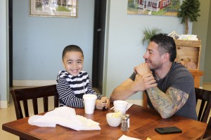 A happy father and son out for lunch at Rendezvous