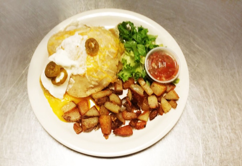 Huevos Rancheros with cottage fried potatoes and salsa
