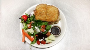 Reuben sandwich with house salad and homemade dressing